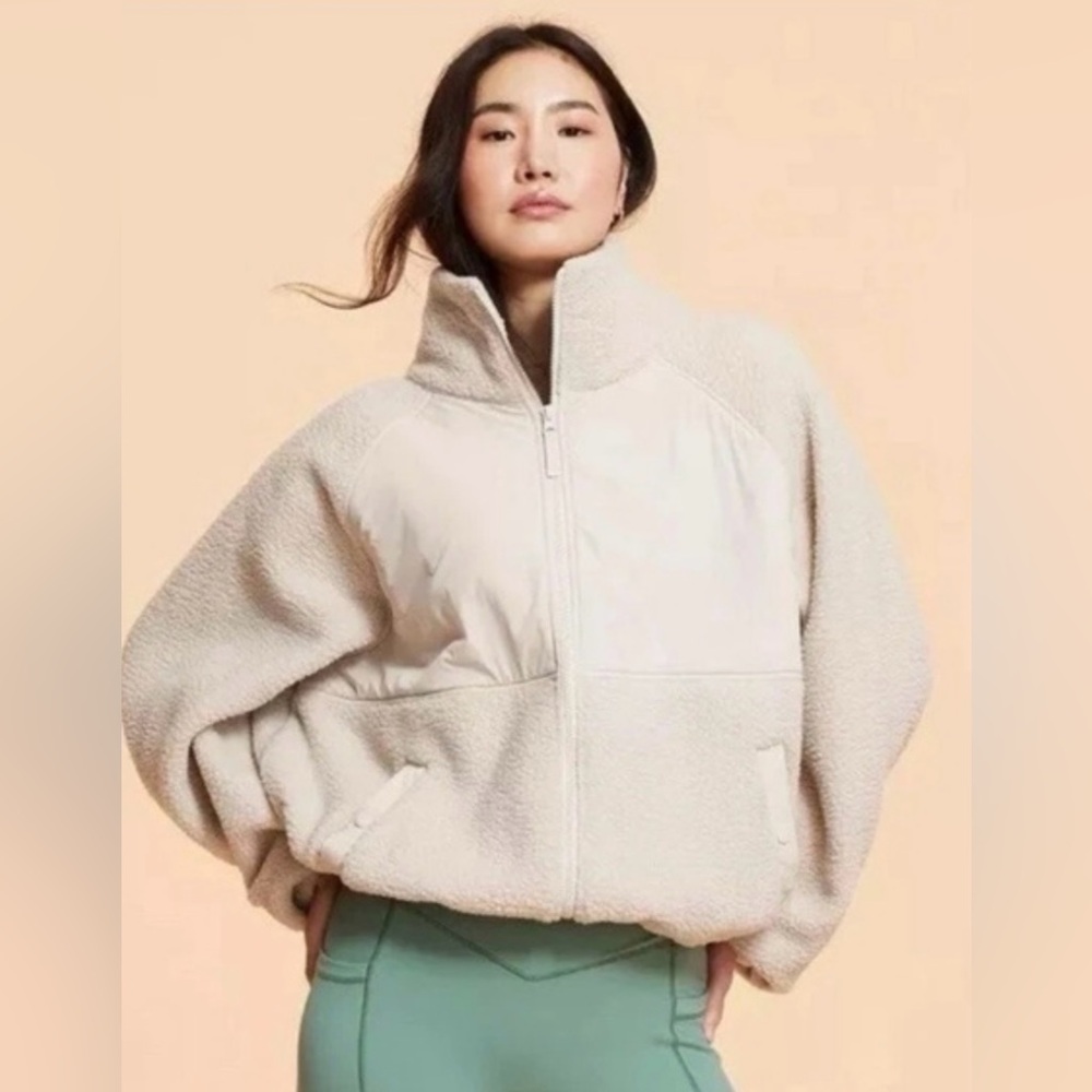 Blogilates featured at Target. Cozy beige/Cream fleece zip up jacket